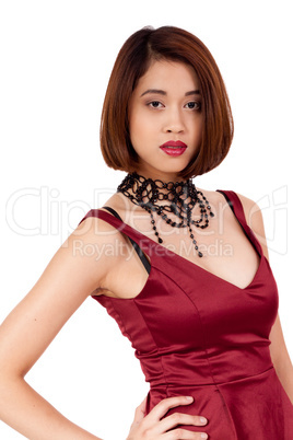 young attractive asian woman with red lips and jewelry isolated