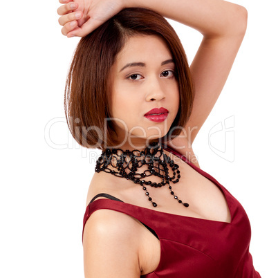 young attractive asian woman with red lips and jewelry isolated