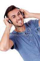 young attractive man listening to music isolated portrait
