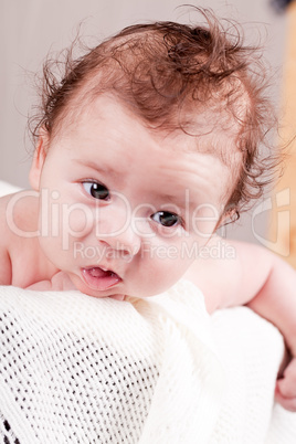 sweet little baby infant toddler on blanket in basket