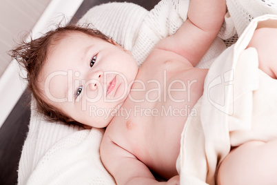 sweet little baby infant toddler on blanket in basket