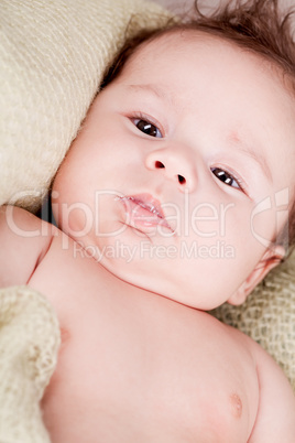 sweet little baby infant toddler on blanket in basket