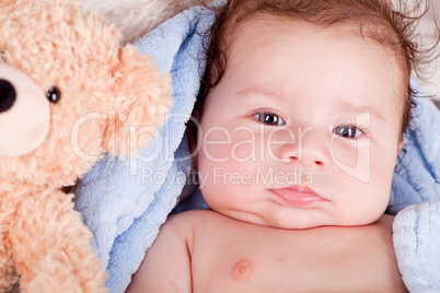 cute little baby todler infant lying on blanket