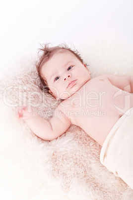 cute little baby infant toddler on white blanket portrait