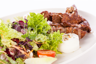 grilled beef stripes fresh salad and goat cheese