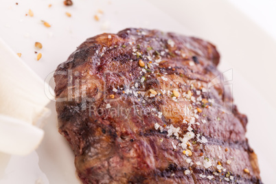 Grilled beef steak with seasoning