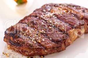 Grilled beef steak with seasoning