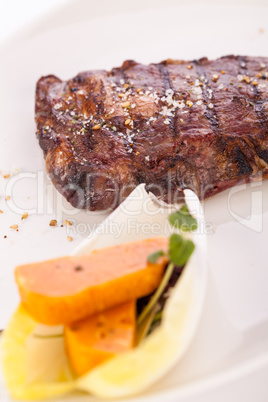 Grilled beef steak with seasoning