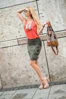 young woman in summer with handbag fashion