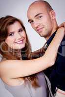 young attractive couple in love embracing portrait