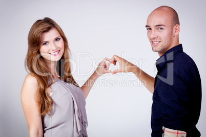 young attractive couple in love embracing portrait