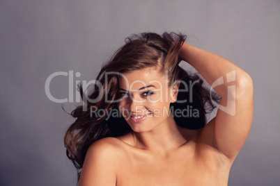 young attractive bunette woman with glossy shiny hair