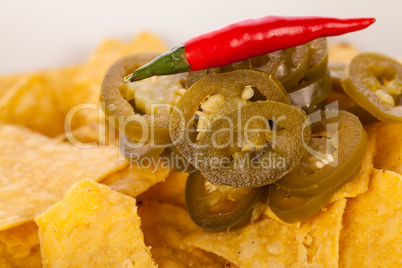 Nachos with cheese sauce and chilli pepperoni