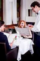 man and woman in restaurant for dinner