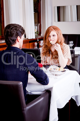 happy couple in restaurant or dinner