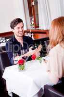 happy couple in restaurant romantic date