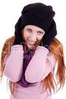 young beautiful woman with hat gloves and scarf in winter isolated