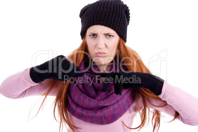 young beautiful woman with hat gloves and scarf in winter isolated