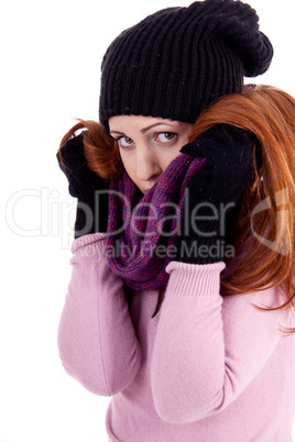 young beautiful woman with hat gloves and scarf in winter isolated
