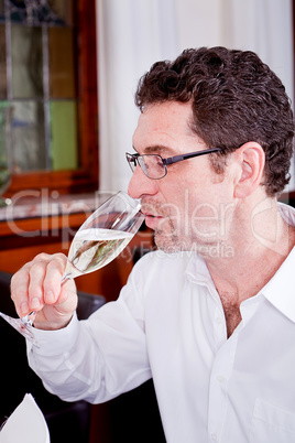 happy smiling couple in restaurant celebrate