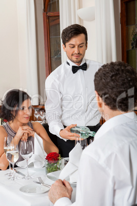 young smiling couple at the restaurant