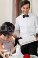 young smiling couple at the restaurant