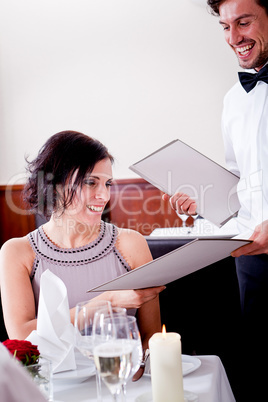 man and woman in restaurant for dinner