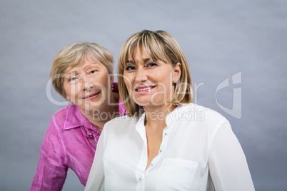 Senior lady with her middle-aged daughter