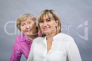 Senior lady with her middle-aged daughter