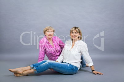 Senior lady with her middle-aged daughter