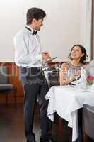 young smiling couple at the restaurant