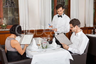 young smiling couple at the restaurant