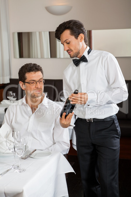 young smiling couple at the restaurant