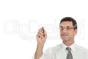 smiling adult businessman write with red pen isolated copyspace