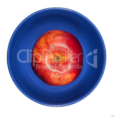 Red apple in a blue bowl
