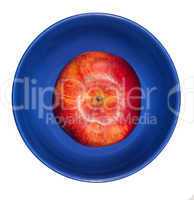 Red apple in a blue bowl