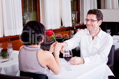 happy couple in restaurant romantic date