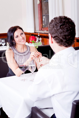 happy couple in restaurant romantic date