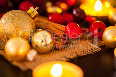 Warm gold and red Christmas candlelight background