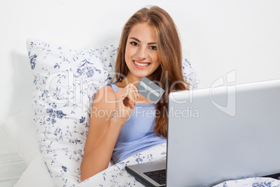 Beautiful woman doing online shopping