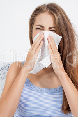 young brunette woman with flu cold influenza