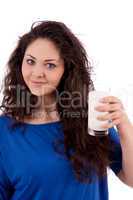 beautiful smiling woman is drinking milk