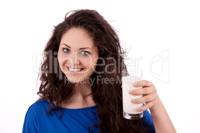 beautiful smiling woman is drinking milk