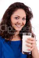 beautiful smiling woman is drinking milk