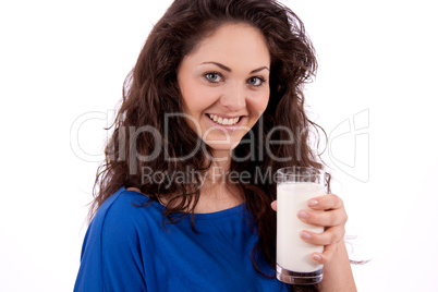 beautiful smiling woman is drinking milk