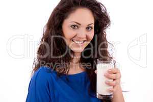 beautiful smiling woman is drinking milk