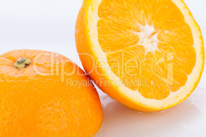 Fresh orange halved to show the pulp