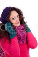 beautiful young smiling girl with hat and scarf in winter