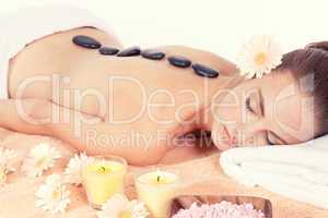 attractive helathy caucasian woman hot stone massage wellness