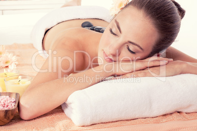 attractive helathy caucasian woman hot stone massage wellness